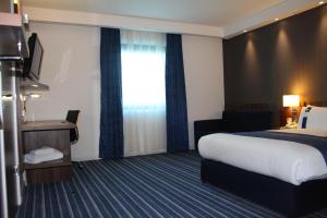 Standard Double Room with Single Sofa Bed and Free Hot Breakfast room in Holiday Inn Express London Stratford an IHG Hotel