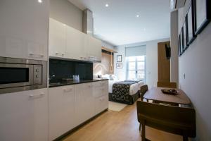 Two-Bedroom Studio Apartment with Balcony room in Legazpi Doce Studios Suites