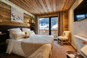 Hotels Hotel-Chalet Les Ecureuils Jardin, Piscine, Sauna : photos des chambres