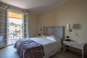 Deluxe Triple Room with Balcony room in Hotel Villa Cappugi