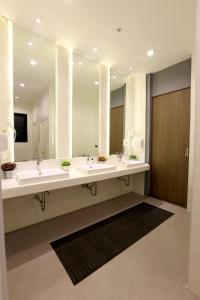 1 người trong phòng tập thể 8 giường có phòng tắm riêng - Nam & Nữ (1 Person in 8-Bed Dormitory with Private Bathroom - Mixed)