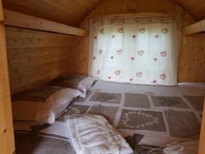 Campings Camping La Grappe Fleurie : Tonneau - Non remboursable