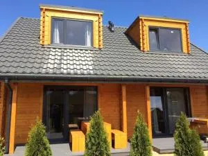 Domki letniskowe La Familia - Bagicz