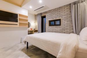 Deluxe giường đôi Có ban công Hướng phố (Deluxe Double Balcony City View)