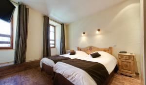 Hotels Hotel Du Commerce : photos des chambres