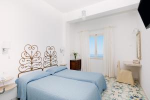Quadruple Room with Sea View room in Hotel Pupetto