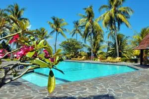 Puri Bunga Beach Cottages - Mangsit