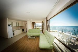 Three-Bedroom Apartment with Balcony room in Premier Fort Beach Resort