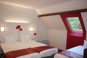 Hotels Latitude Ouest Hotel Restaurant & Spa : photos des chambres