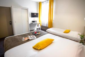 Hotels Hotel De La Pommeraie : photos des chambres