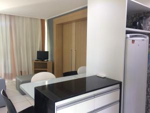 Flat no Beach Class Muro Alto