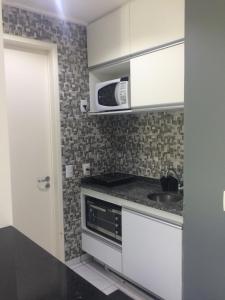 Flat no Beach Class Muro Alto