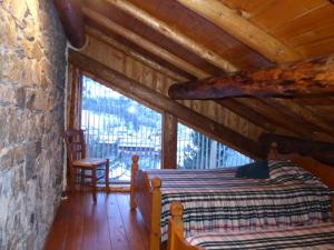 Appartements Appartement cosy pour 4 personnes en chalet de pierres : photos des chambres