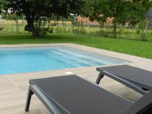 Appartements Gite autonome, La grange a foin, piscine ! : photos des chambres