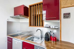 Appartements Le Woody, Centre-ville, Parking gratuit : photos des chambres