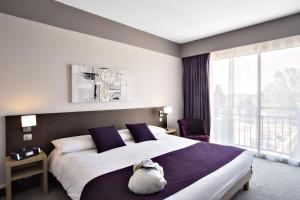 Hotels Mercure Toulouse Aeroport Golf de Seilh : photos des chambres