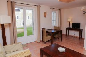 Appartements Les Bastides du Golf d'Albret : photos des chambres