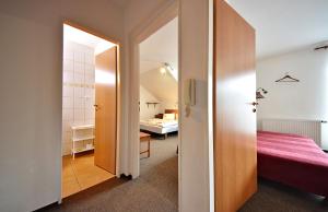 Two-Bedroom Suite with Balcony room in Pension Karin