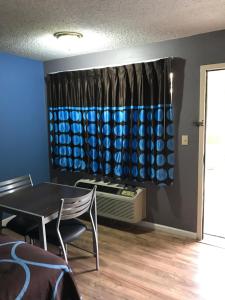 Queen Room with Two Queen Beds - Smoking room in Super 8 by Wyndham Slidell