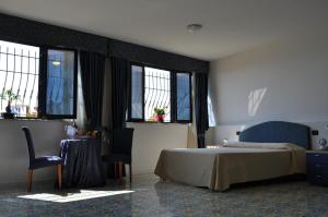 Quadruple Room room in Grand Hotel La Playa