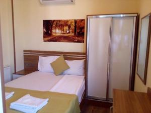 Economy Triple Room room in Olimpiyat Hotel Izmir