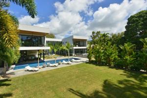 Glass House On The Beach