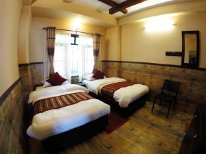 Levný dvoulůžkový pokoj s manželskou postelí nebo oddělenými postelemi