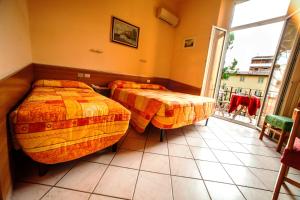 Triple Room with Balcony room in Hotel Villa Il Castagno