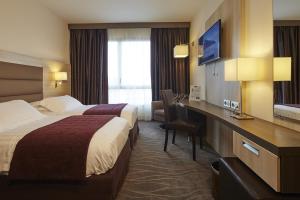Hotels Kyriad Prestige Lyon Est - Saint Priest Eurexpo Hotel and SPA : Chambre Lits Jumeaux