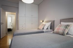 Two-Bedroom Apartment room in Absolute Athens I