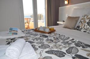 Hotels Hotel de la Mer : photos des chambres