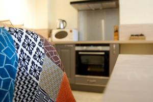 Appartements Vue imprenable sur la Mairie : photos des chambres