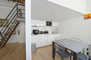 Appartements L'Argenterie, Apparts de charme climatise parking gratuit : photos des chambres