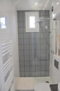 Appartements Longchamp Apartment : photos des chambres