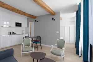 Appartements L'Argenterie, Apparts de charme climatise parking gratuit : photos des chambres