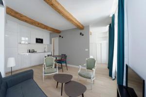 Appartements L'Argenterie, Apparts de charme climatise parking gratuit : photos des chambres