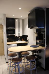 Appartements Home Confort : photos des chambres