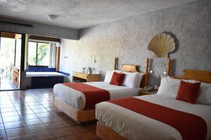 Suite with Two Double Beds with Spa Bath room in Hosteria Las Quintas Hotel & Spa