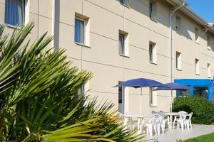 Hotels Atena Bordeaux Sud Est Creon - Velo Friendly : photos des chambres