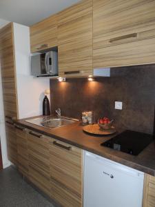 Appart'hotels Residence Les Baladines : photos des chambres