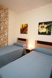 Two-Bedroom Apartment (3 Adults + 1 Child) room in Apartamentos Turisticos Aguilas de los Collados
