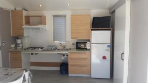 Complexes hoteliers Camping La Pinede : photos des chambres