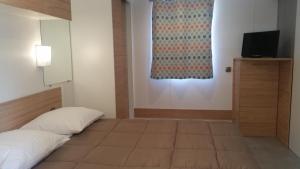 Complexes hoteliers Camping La Pinede : photos des chambres