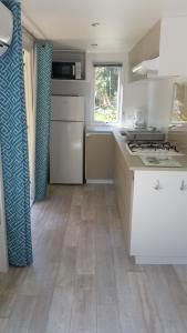 Complexes hoteliers Camping La Pinede : photos des chambres
