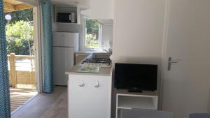 Complexes hoteliers Camping La Pinede : photos des chambres