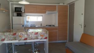 Complexes hoteliers Camping La Pinede : photos des chambres
