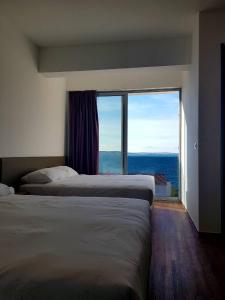 Deluxe Double Room with Balcony and Sea View room in Bara Bay