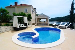 Waterfront villa with pool