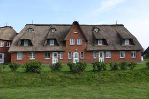 Chata Reetdachhaus Deichkrone Nordstrand Německo