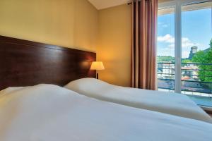 Appart'hotels Zenitude Hotel-Residences Les Jardins de Lourdes : Chambre Lits Jumeaux Supérieure